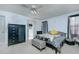Spacious main bedroom with carpeted floor, ceiling fan and large bed at 3251 Hunters Crossing Pt, Lithonia, GA 30038