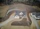 Two-story house with landscaping and driveway at 7760 Pleasant Hollow Ln, Cumming, GA 30041