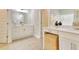 Elegant bathroom with double vanity and neutral color scheme at 7760 Pleasant Hollow Ln, Cumming, GA 30041