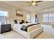 Spacious main bedroom with large windows and plush carpeting at 7760 Pleasant Hollow Ln, Cumming, GA 30041