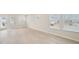 Bright, open living area with hardwood floors and natural light at 701 Lily Blossom Path Path, Lawrenceville, GA 30045