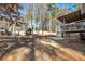 Large backyard with wooded area and deck at 1501 Old John Ward Sw Rd, Marietta, GA 30064