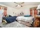 Spacious bedroom with two double beds and large windows at 1501 Old John Ward Sw Rd, Marietta, GA 30064