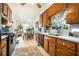 Kitchen with wood cabinets, gas stove and island at 1501 Old John Ward Sw Rd, Marietta, GA 30064