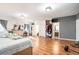 Spacious main bedroom with ensuite bathroom and hardwood floors at 1501 Old John Ward Sw Rd, Marietta, GA 30064