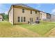 Backyard with a patio and grilling area at 1354 Slate Bend Dr, Dacula, GA 30019