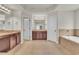 Double vanity bathroom with a soaking tub and separate shower at 1354 Slate Bend Dr, Dacula, GA 30019