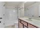 Clean bathroom with tub, shower, and vanity at 1354 Slate Bend Dr, Dacula, GA 30019