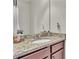 Bathroom with granite countertop and dark brown vanity at 1354 Slate Bend Dr, Dacula, GA 30019