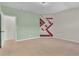 Bedroom with an accent wall and neutral carpet at 1354 Slate Bend Dr, Dacula, GA 30019