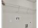 Laundry room with wire shelving and hookups at 1354 Slate Bend Dr, Dacula, GA 30019
