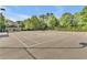 Two lighted tennis courts with perimeter fencing at 1354 Slate Bend Dr, Dacula, GA 30019