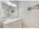 Bathroom with white vanity, marble countertop, and shower at 171 Johnson Ferry Nw Rd, Atlanta, GA 30328