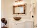 Stylish powder room with unique mirror and vessel sink at 171 Johnson Ferry Nw Rd, Atlanta, GA 30328