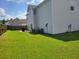 Large backyard with grassy area and privacy fence at 74 Windsor Way, Riverdale, GA 30274