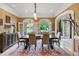 Spacious dining room with hardwood floors and French doors leading to a patio at 765 Estate Ne Way, Atlanta, GA 30319