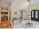 Two-story foyer with tile floors and chandelier at 765 Estate Ne Way, Atlanta, GA 30319