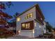 Modern two-story home with a red door and attached garage at 165 Mayson Ne Ave # A, Atlanta, GA 30307