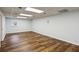 Spacious basement with vinyl flooring and ample lighting, perfect for storage or activities at 2947 Dunnington Cir, Chamblee, GA 30341