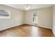 Bedroom with hardwood floors, ceiling fan and two bright windows at 2947 Dunnington Cir, Chamblee, GA 30341