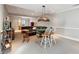 Spacious basement featuring a billiard table, bar stools, and comfortable leather seating at 3970 Bridgeman Cir, Cumming, GA 30041