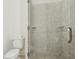 Modern bathroom features a spacious tiled shower with glass door at 3970 Bridgeman Cir, Cumming, GA 30041