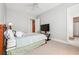 Bedroom featuring carpet, ceiling fan and a window at 3970 Bridgeman Cir, Cumming, GA 30041
