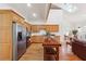 Bright kitchen features custom wood cabinets, stainless steel appliances, and a functional center island at 3970 Bridgeman Cir, Cumming, GA 30041