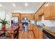 View of a well-appointed kitchen featuring custom wood cabinets, granite countertops, and stainless steel appliances at 3970 Bridgeman Cir, Cumming, GA 30041