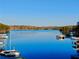 Beautiful lake view featuring a picturesque waterfront setting on a sunny day at 3970 Bridgeman Cir, Cumming, GA 30041
