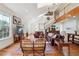 Spacious living room with high ceilings, natural light, and hardwood floors at 3970 Bridgeman Cir, Cumming, GA 30041