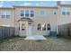 Townhome backyard with small patio and fenced area at 5823 Keystone Pt, Lithonia, GA 30058