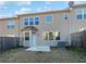 Private backyard with patio and wooden fence at 5823 Keystone Pt, Lithonia, GA 30058