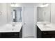 Double vanity bathroom with dark cabinets and white countertops at 5823 Keystone Pt, Lithonia, GA 30058