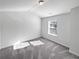 Bright bedroom with carpet and large window at 5823 Keystone Pt, Lithonia, GA 30058