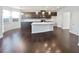 Modern kitchen with dark cabinets, white countertops, and an island at 5823 Keystone Pt, Lithonia, GA 30058