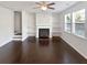 Living room with fireplace and hardwood floors at 5823 Keystone Pt, Lithonia, GA 30058