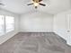 Spacious main bedroom with high ceilings and neutral carpeting at 5823 Keystone Pt, Lithonia, GA 30058