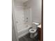 Clean bathroom with a tub, toilet, and vanity at 6101 Waldrop Pl, Decatur, GA 30034