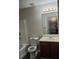 Clean bathroom with vanity, toilet, and bathtub at 6101 Waldrop Pl, Decatur, GA 30034