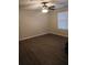 Bright bedroom with ceiling fan and wood-look floors at 6101 Waldrop Pl, Decatur, GA 30034