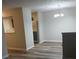Bright dining area with chandelier and wood-look floors at 6101 Waldrop Pl, Decatur, GA 30034