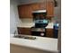Modern kitchen with stainless steel appliances and tile backsplash at 6101 Waldrop Pl, Decatur, GA 30034