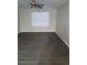 Spacious living room with wood-look floors at 6101 Waldrop Pl, Decatur, GA 30034