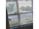 View from window showing street and some landscaping at 6101 Waldrop Pl, Decatur, GA 30034