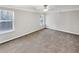 Large bedroom with neutral walls and carpet at 508 Kensington Park Dr, Canton, GA 30114