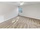 Bright bedroom with neutral carpeting and a large window at 508 Kensington Park Dr, Canton, GA 30114