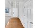 Bright entryway with wood-look flooring, and neutral walls at 508 Kensington Park Dr, Canton, GA 30114