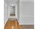 Hallway with light grey walls and wood-look flooring at 508 Kensington Park Dr, Canton, GA 30114