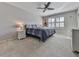 Calm bedroom with carpet, a ceiling fan, and window with shutters at 535 Crested Hawk Rdg, Canton, GA 30114